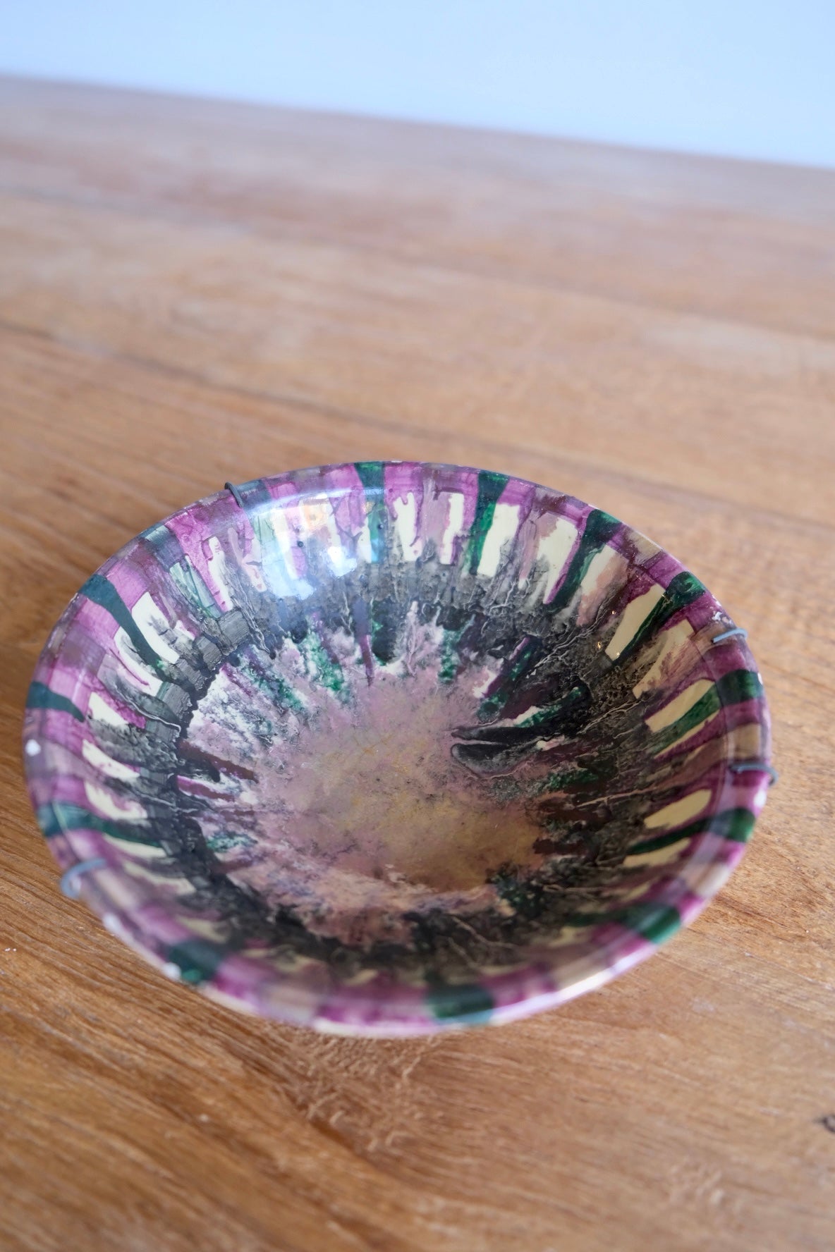 Small earthenware metallic glazed bowl
