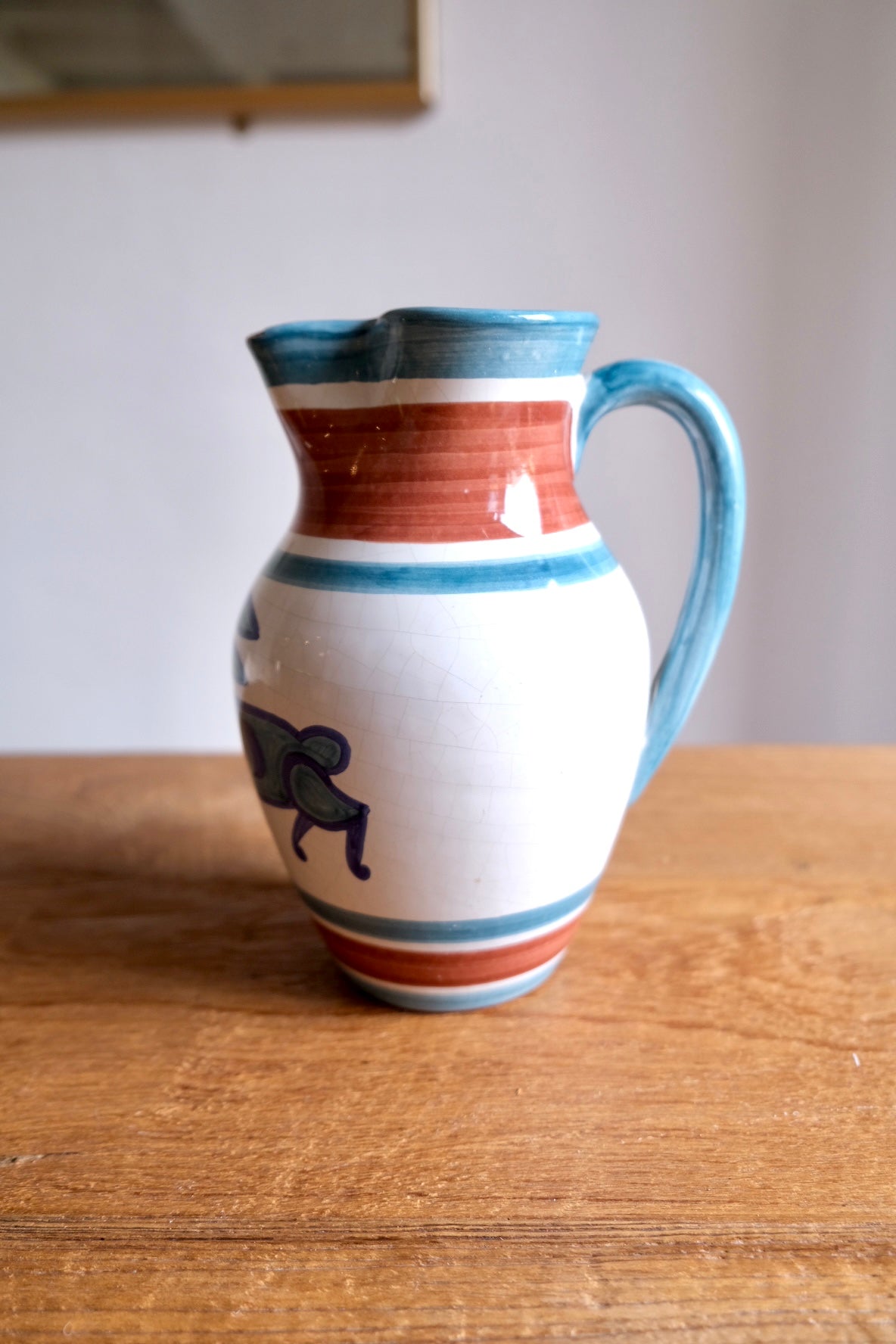 Ceramic jug with hand-painted rabbit