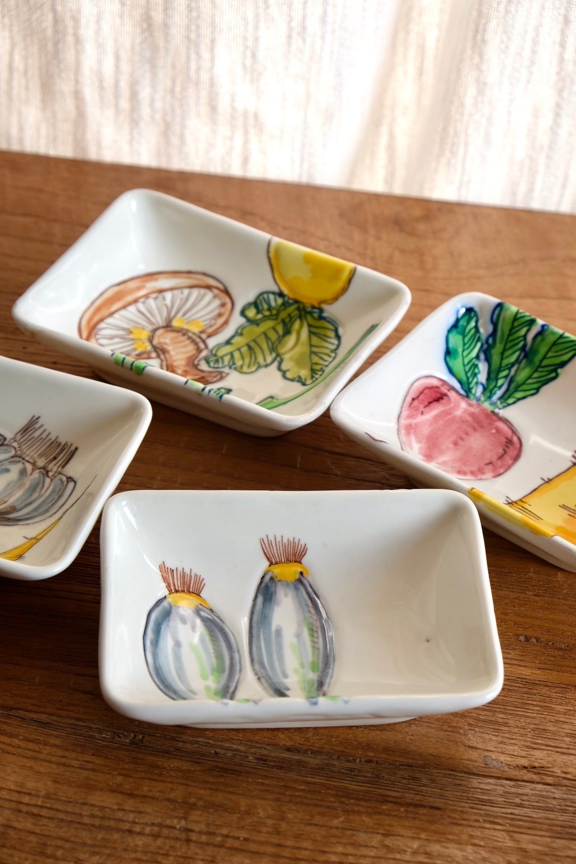 Set of 4 ceramic dishes with hand-painted vegetables
