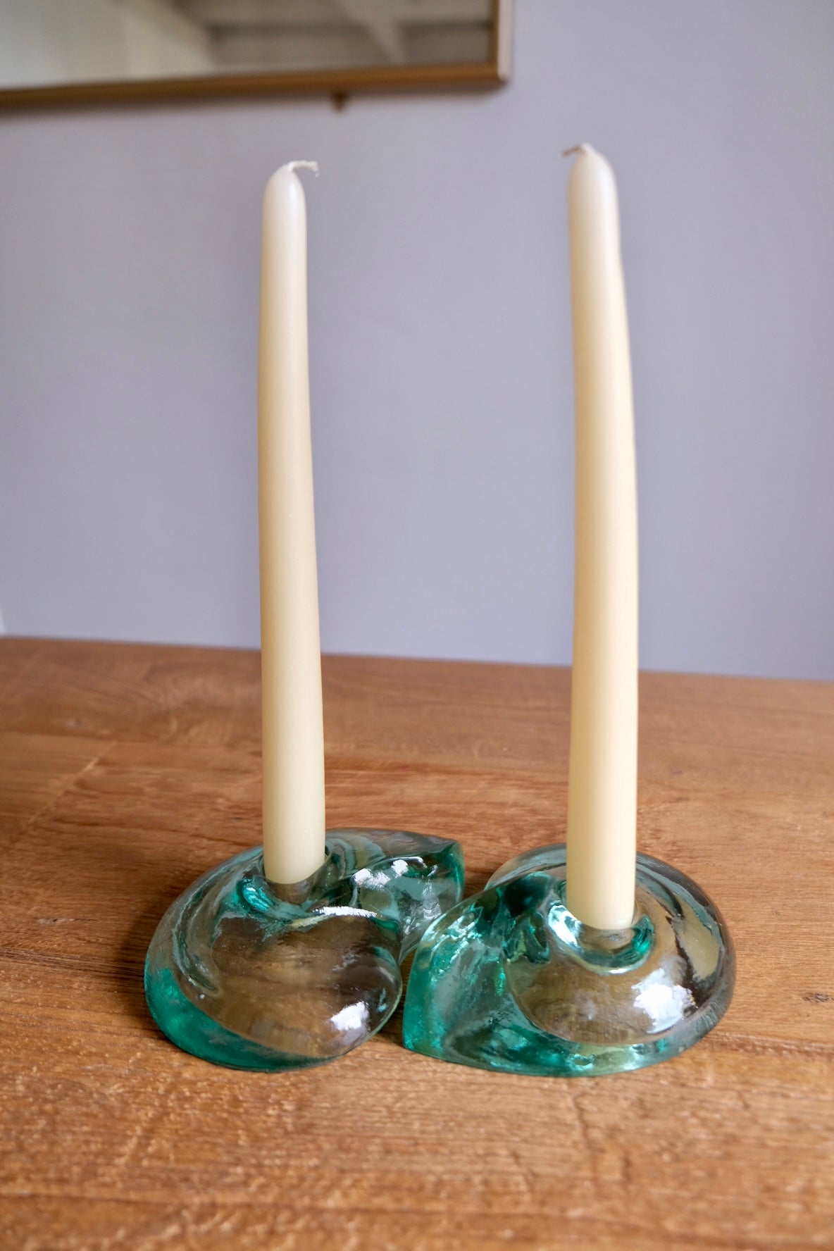 Pair of green glass shell candle holders