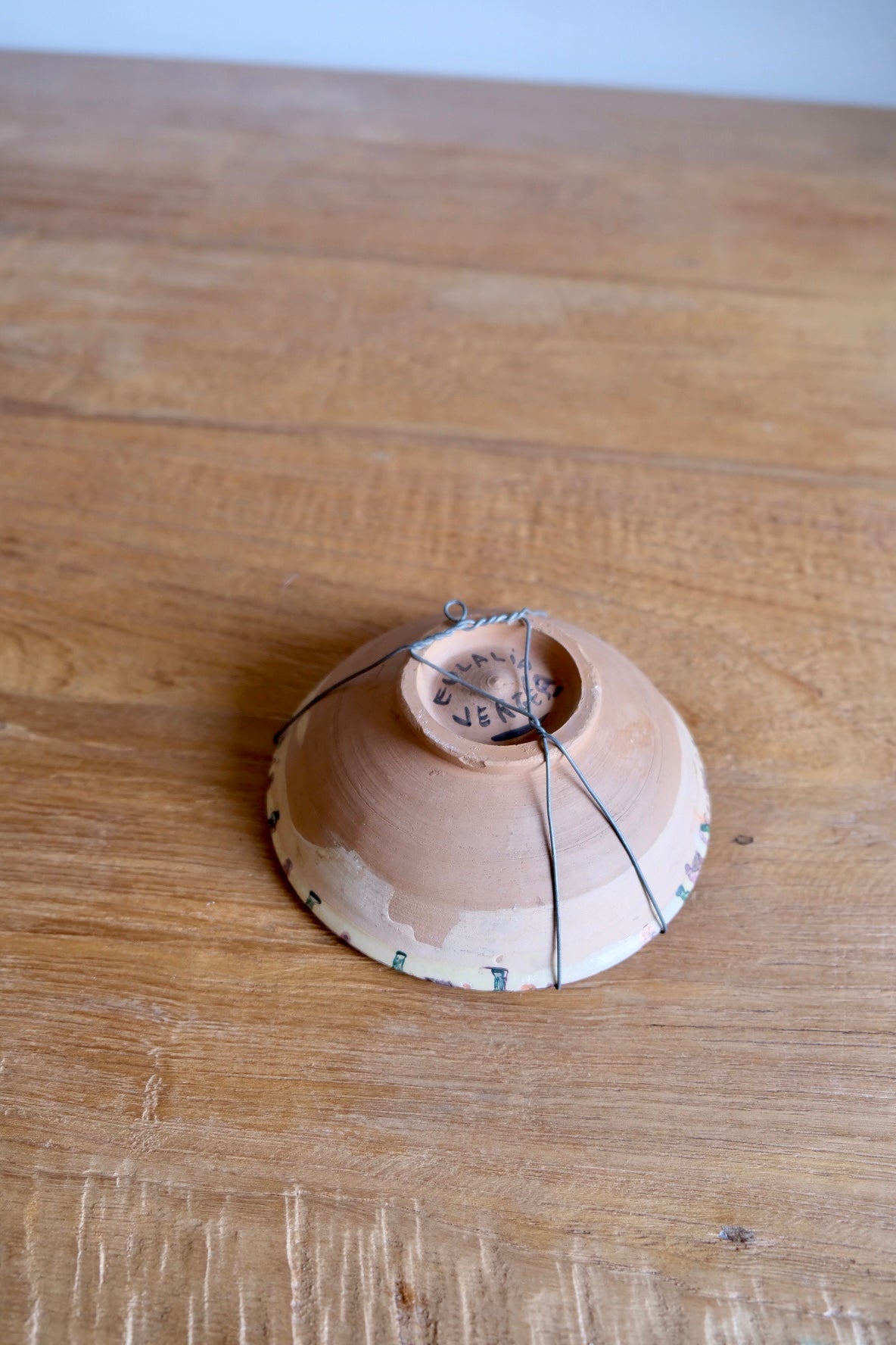 Small earthenware metallic glazed bowl
