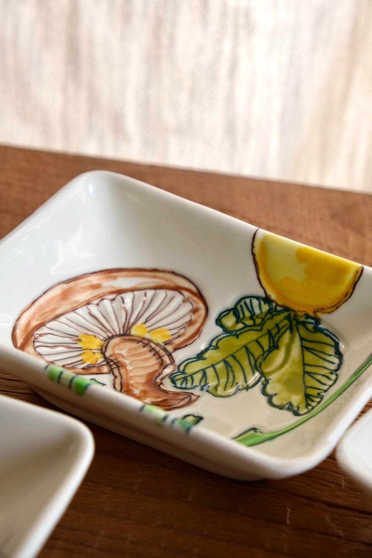 Set of 4 ceramic dishes with hand-painted vegetables