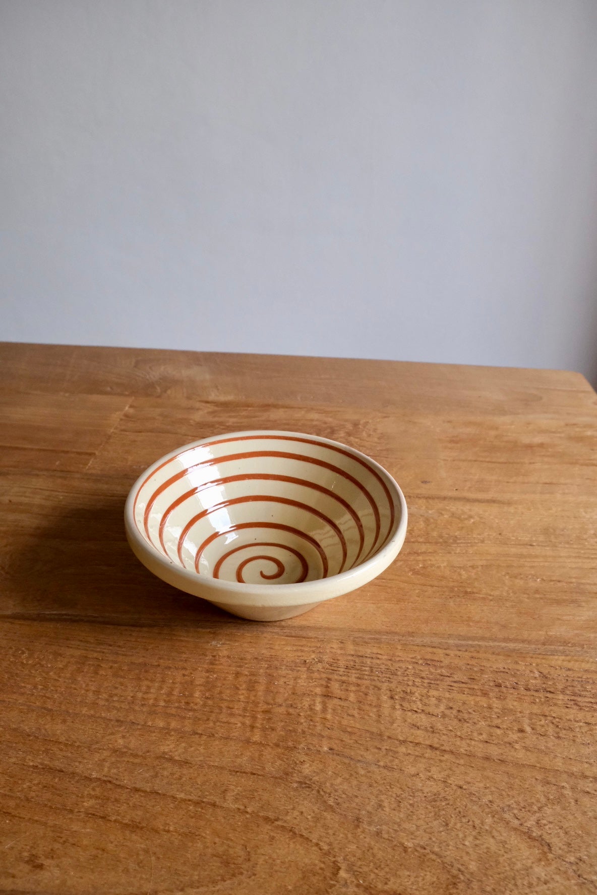 Spanish ceramic orange swirl serving bowl