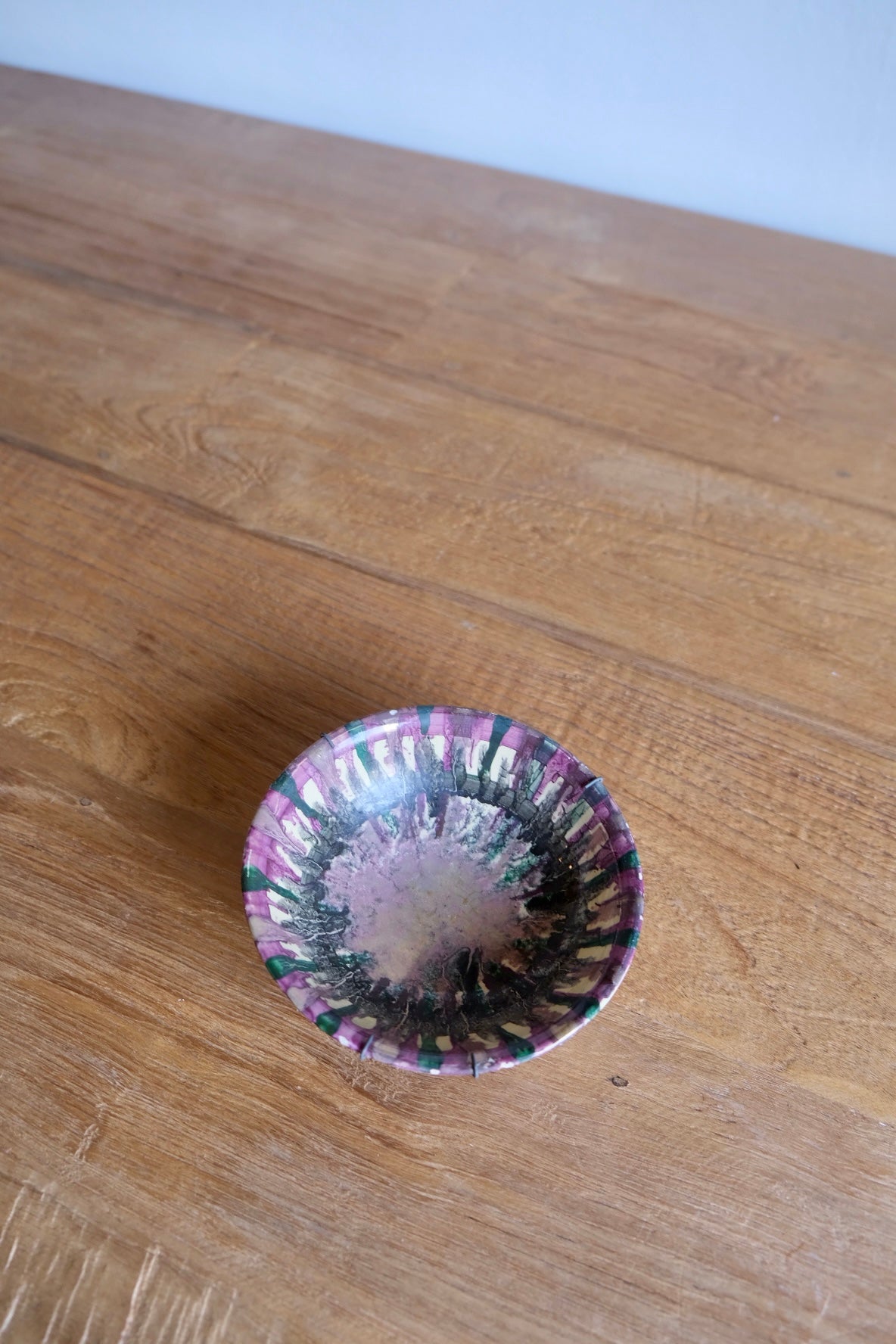 Small earthenware metallic glazed bowl