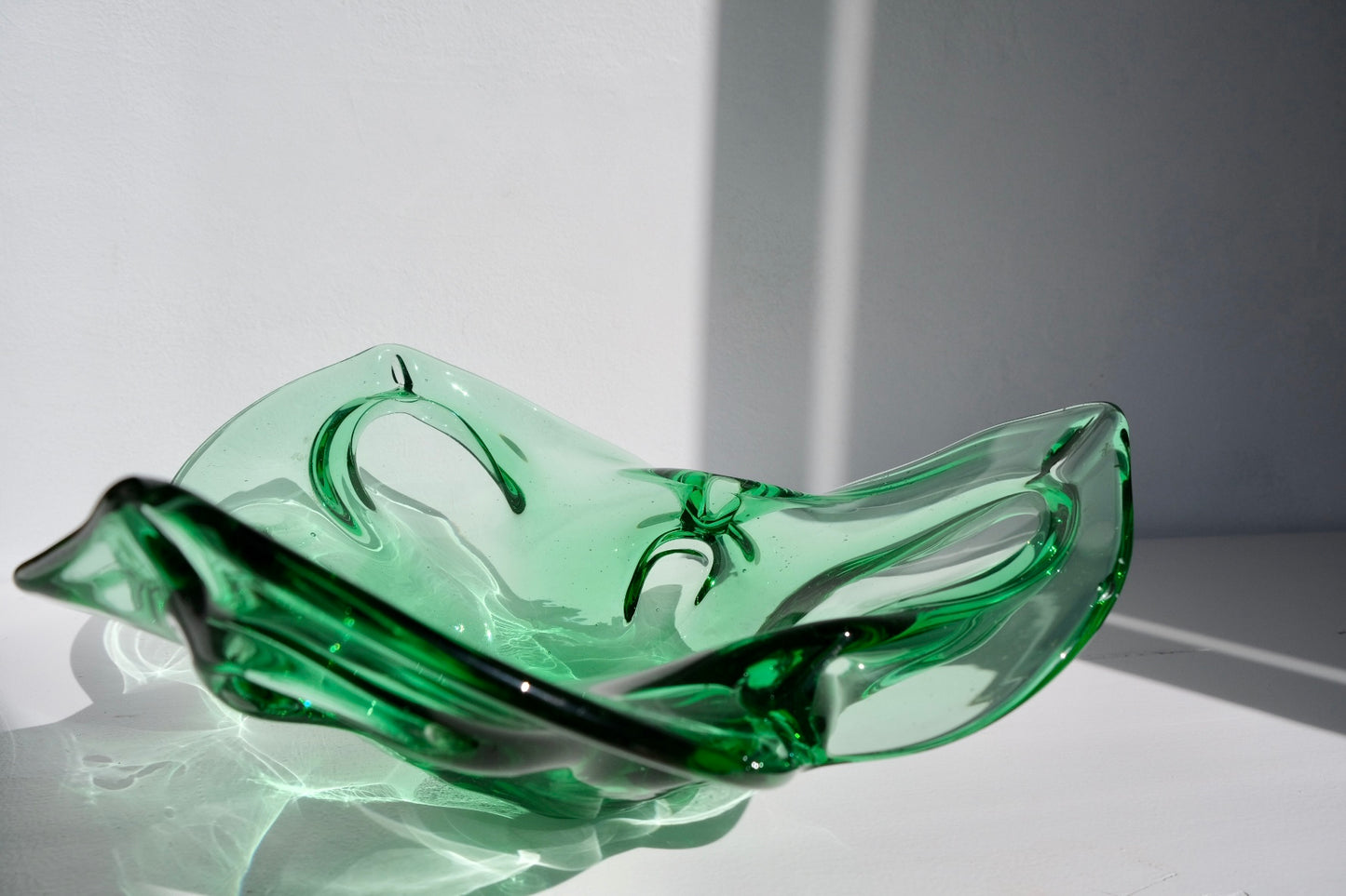 Large Italian emerald glass bowl, flower-shaped