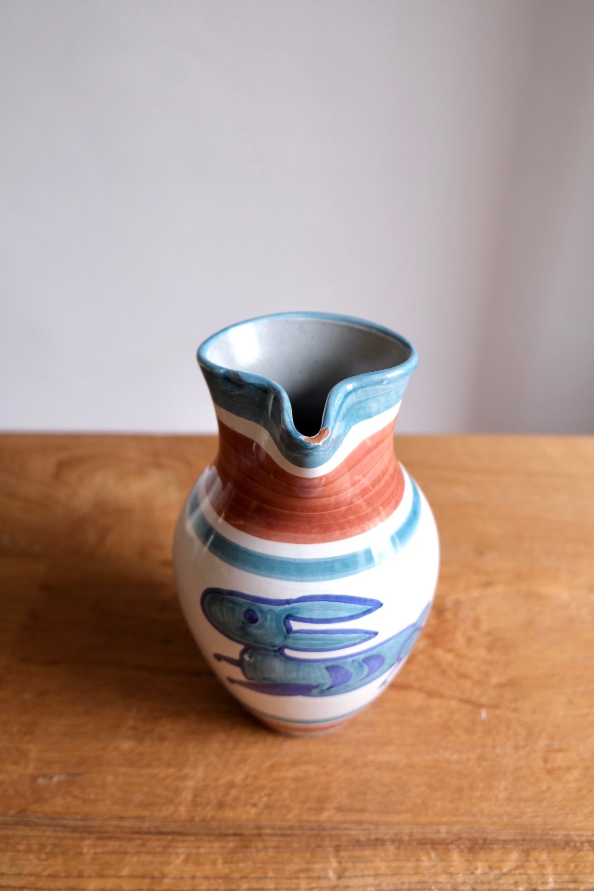 Ceramic jug with hand-painted rabbit