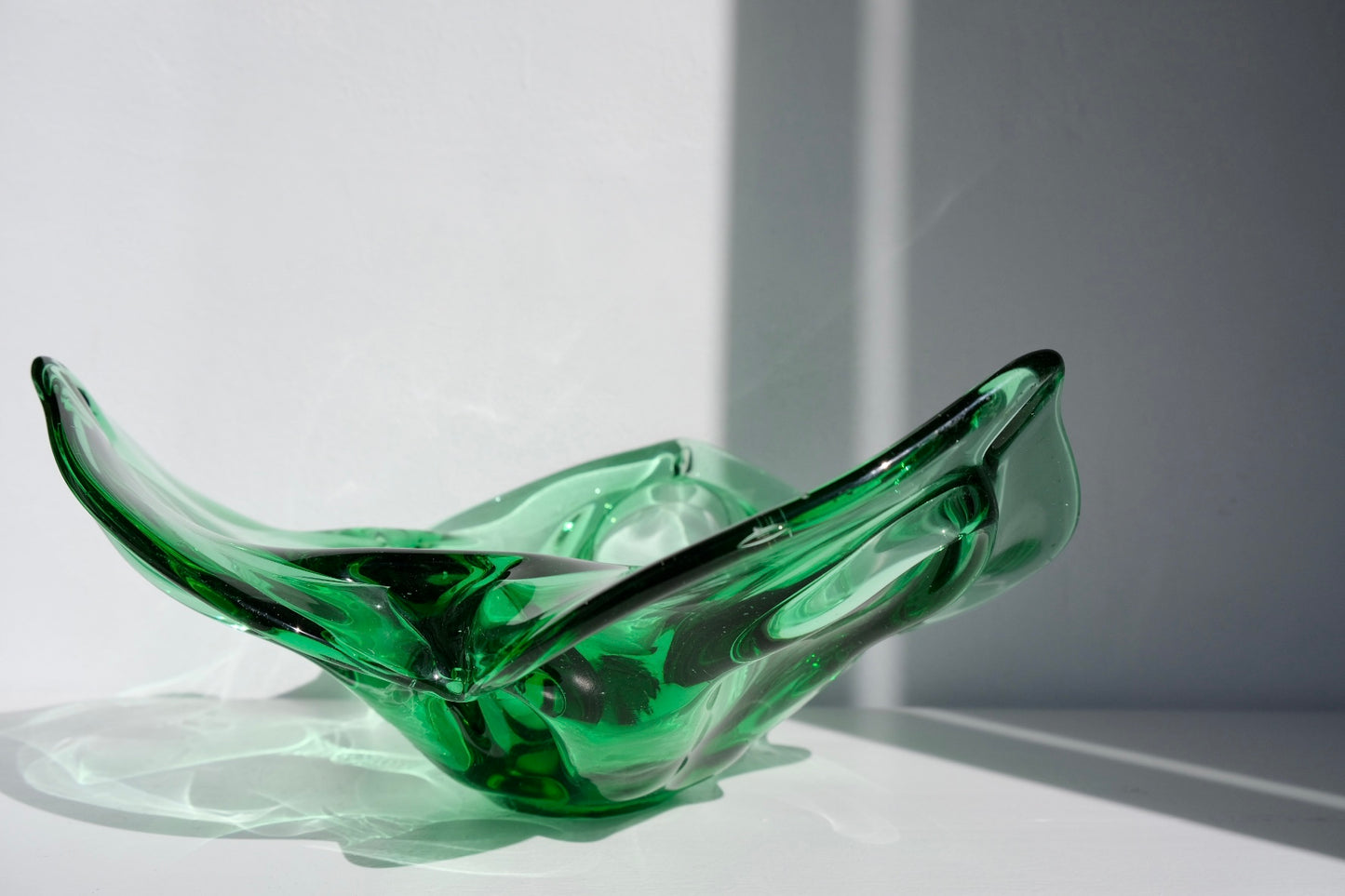 Large Italian emerald glass bowl, flower-shaped