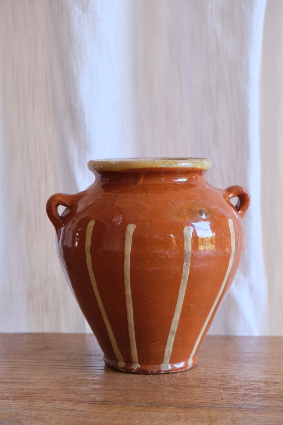 Two-handled earthenware vessel