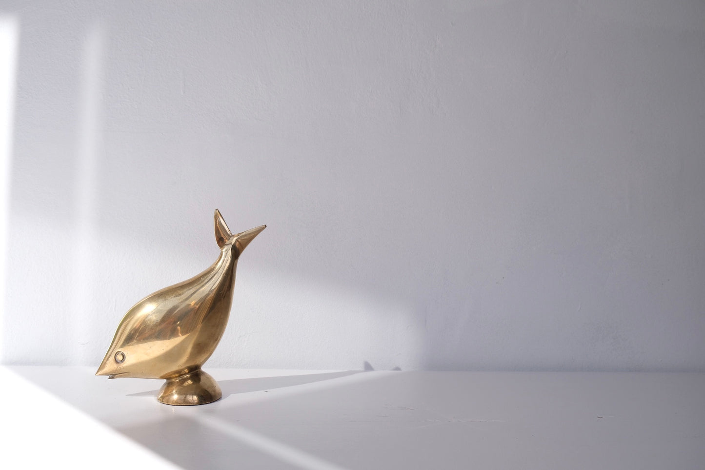 Brass tuna sculpture