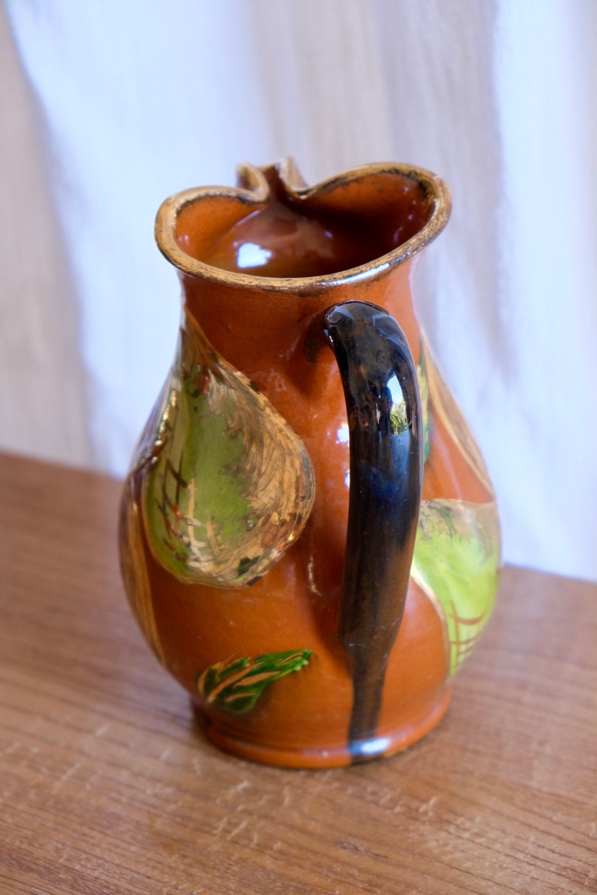 Ceramic jug with pomegranates