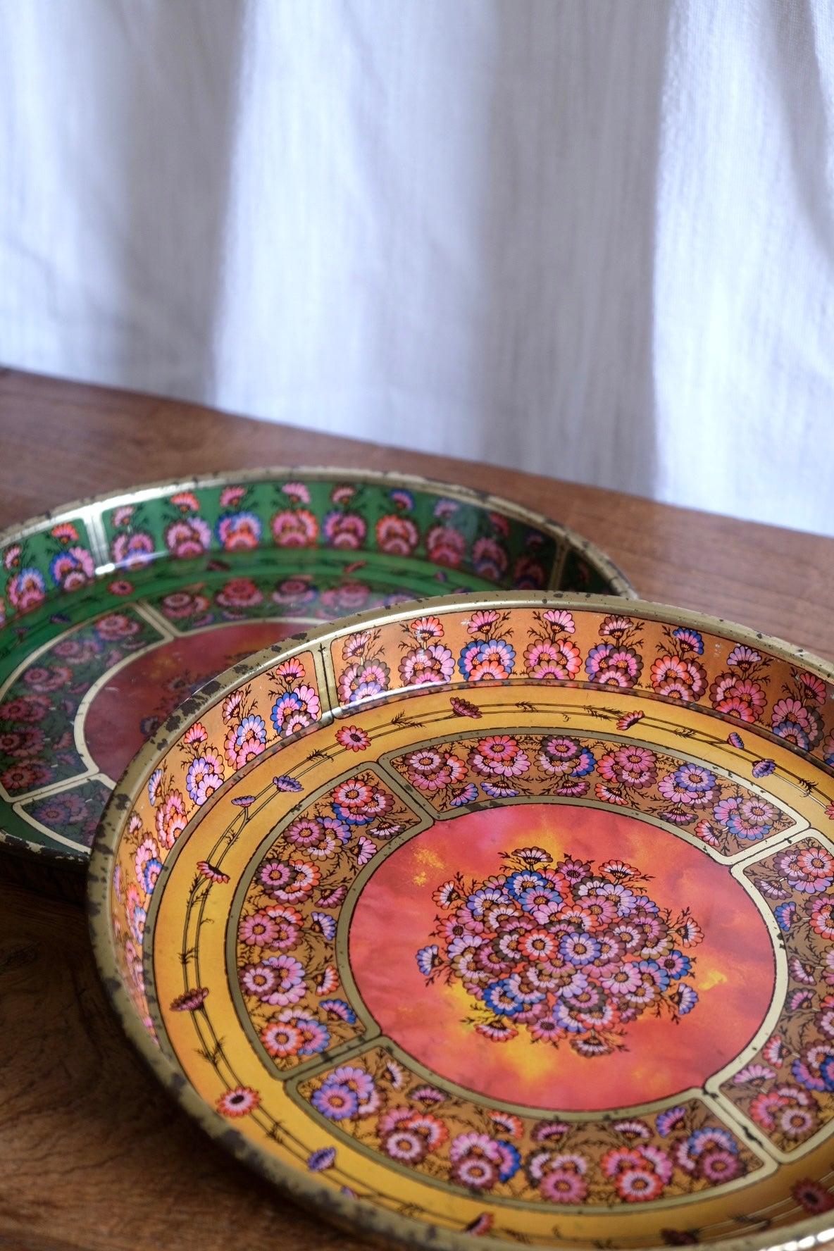 Pair of hand-painted stainless steel trays