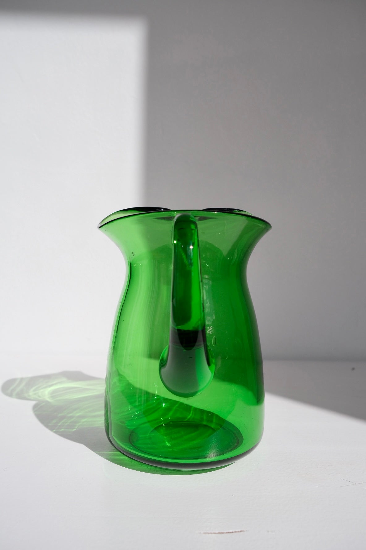 Emerald transparent green glass pitcher jug