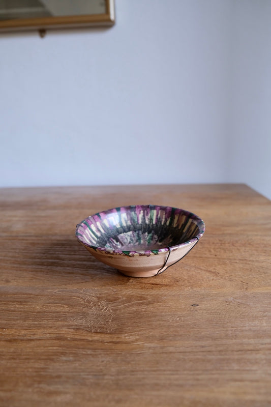 Small earthenware metallic glazed bowl