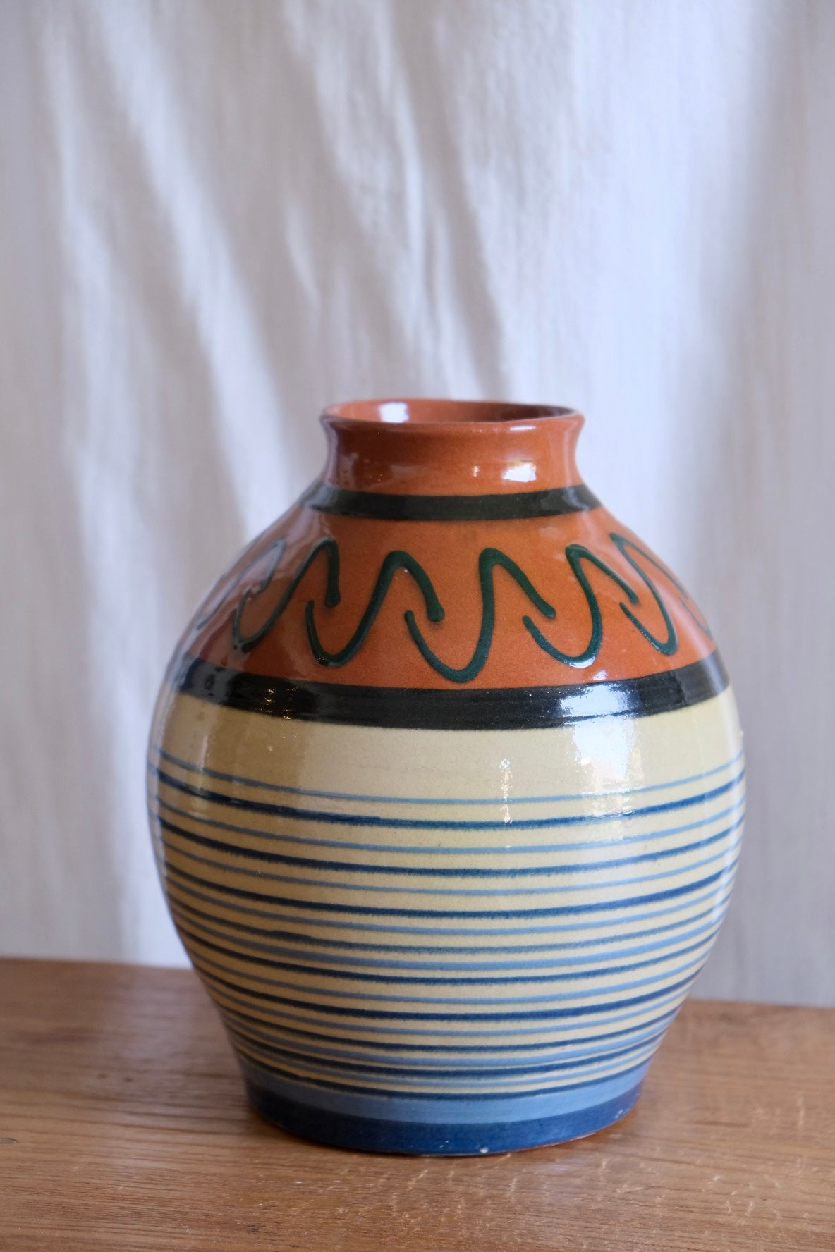 Stripy terracotta vase