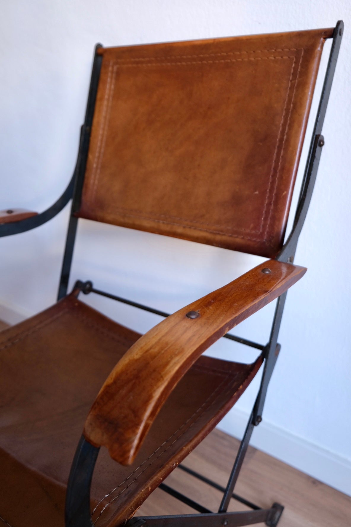 Mid-century foldable chair, leather, wood and iron. France