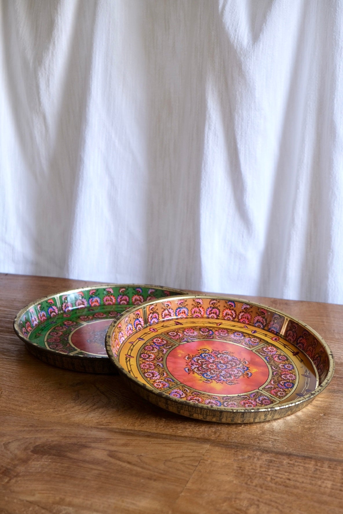 Pair of hand-painted stainless steel trays