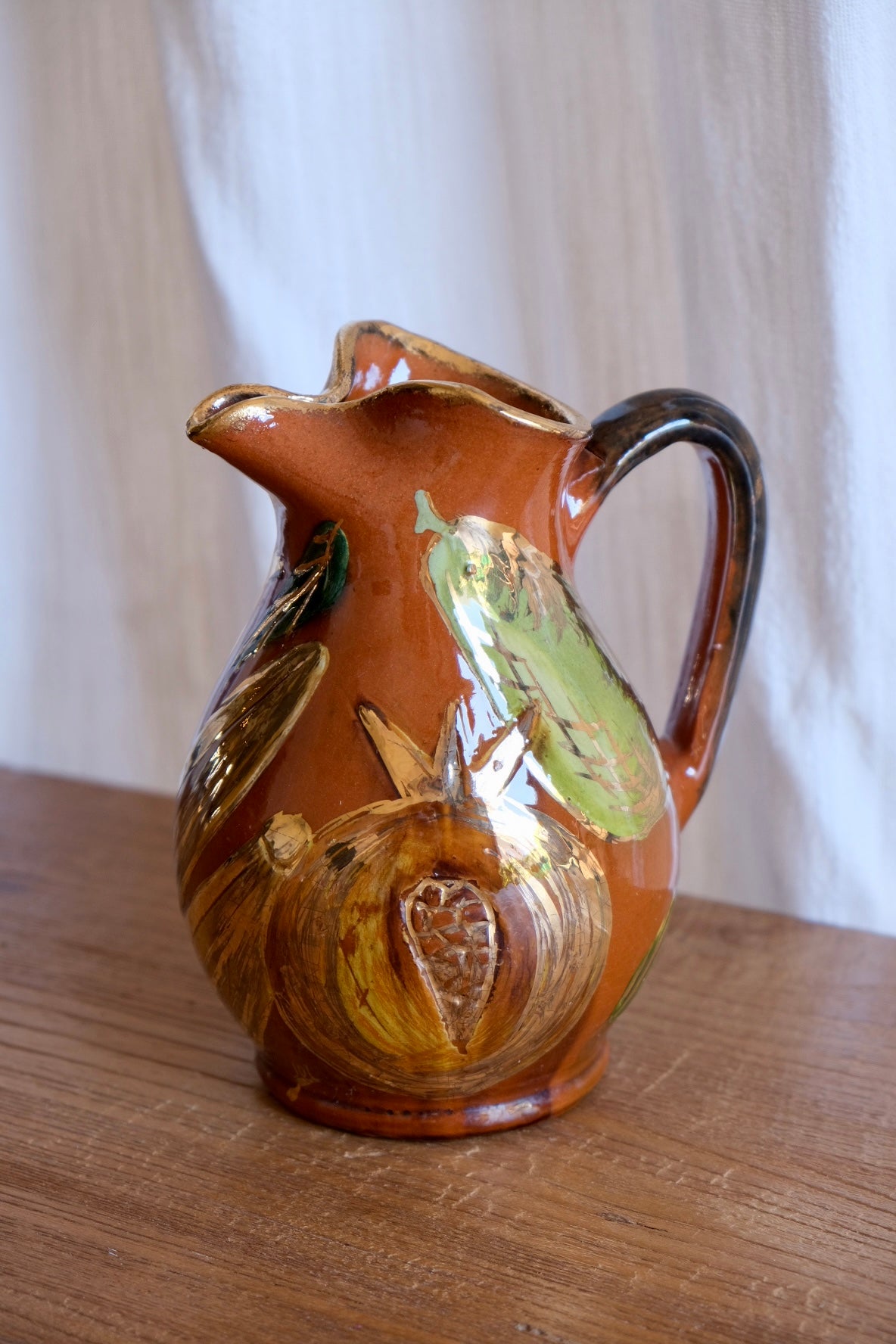 Ceramic jug with pomegranates