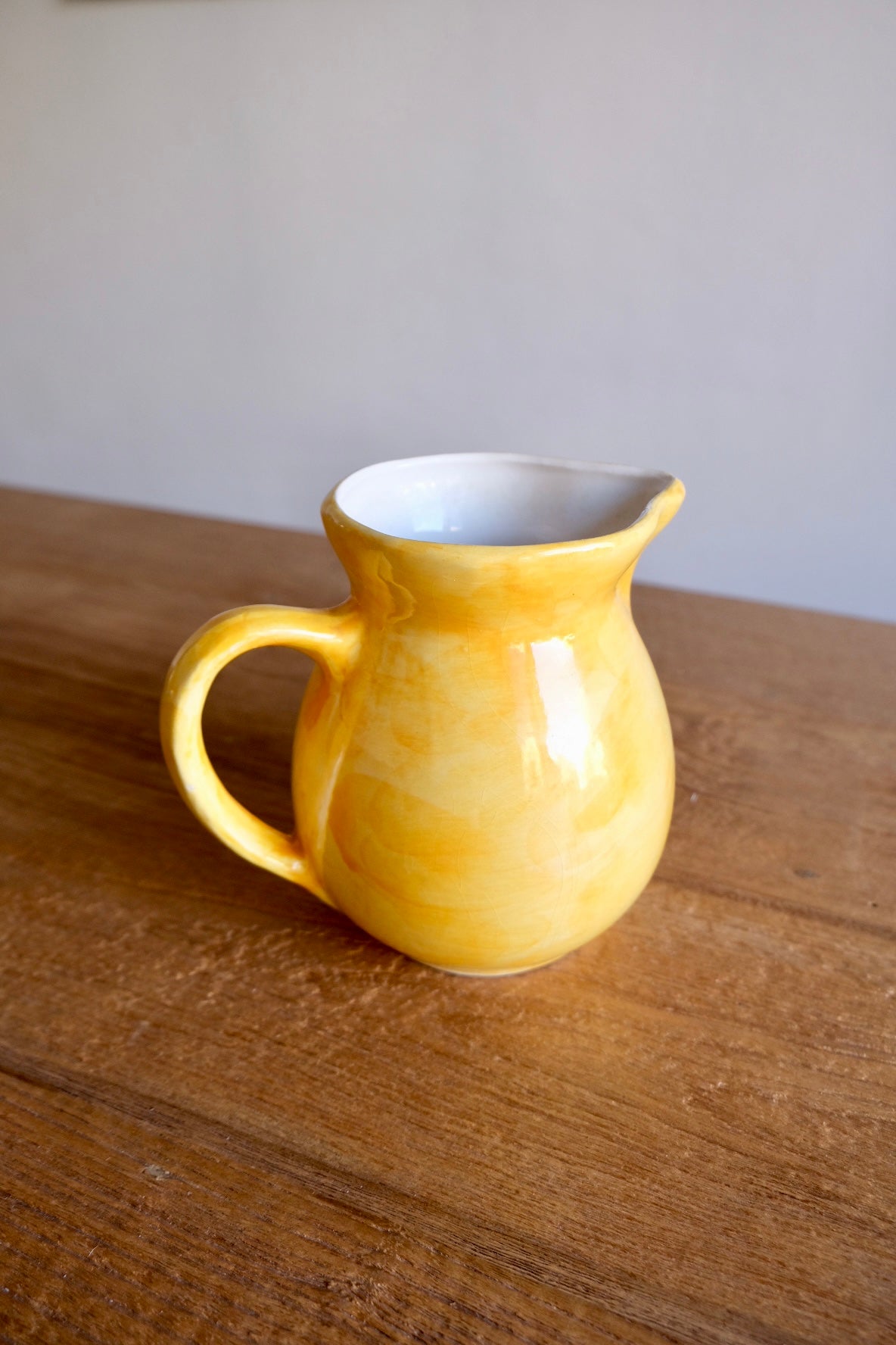 Ceramic jug with hand-painted grapes