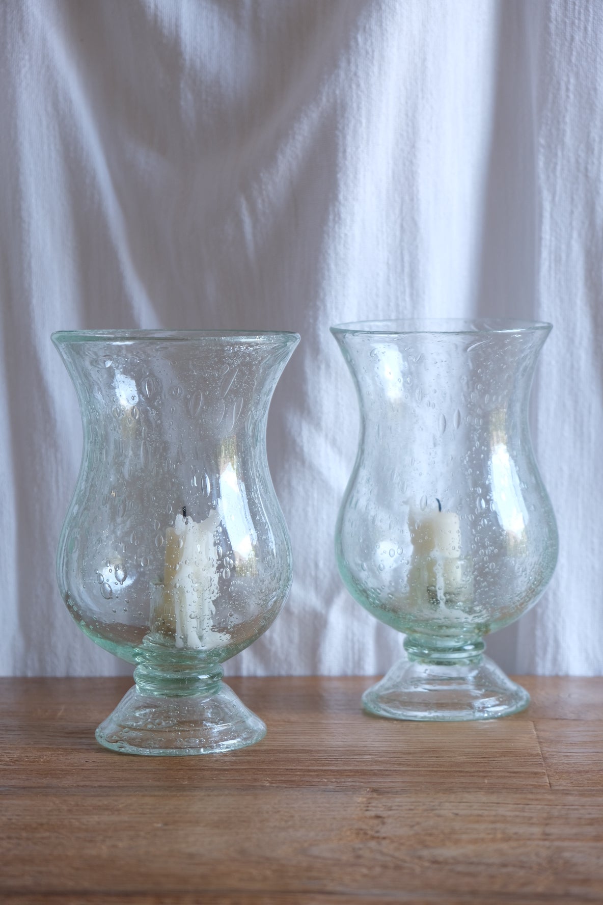 Pair of Biot glass candleholders. 1970s France