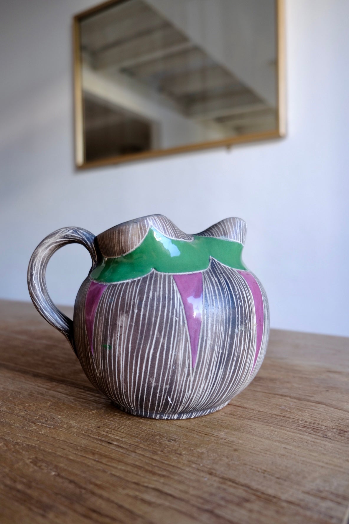 Colourful ceramic water jug