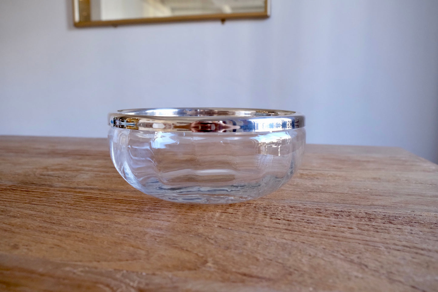 Large glass bowl with silver-plated rim