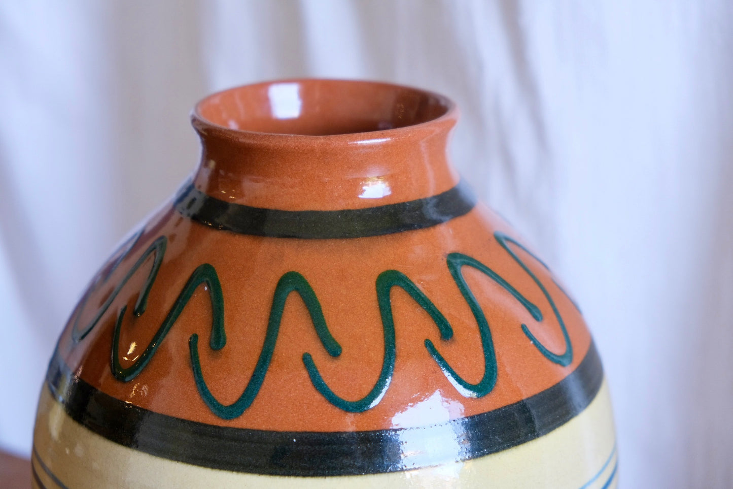 Stripy terracotta vase