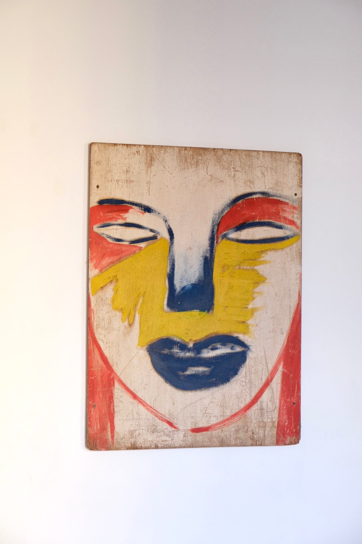 Face on wood panel, Barcelona 1998