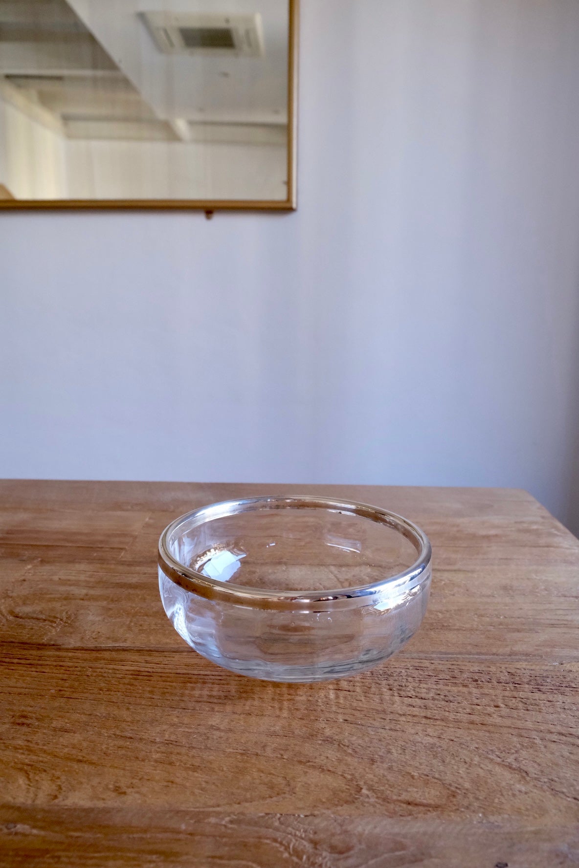 Large glass bowl with silver-plated rim