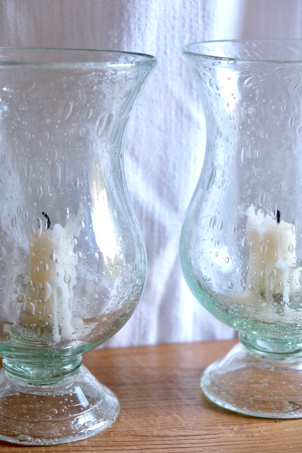 Pair of Biot glass candleholders. 1970s France