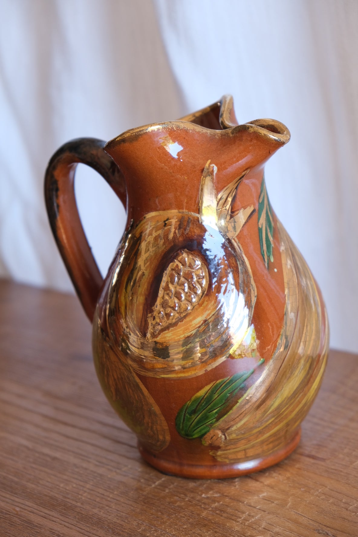 Ceramic jug with pomegranates