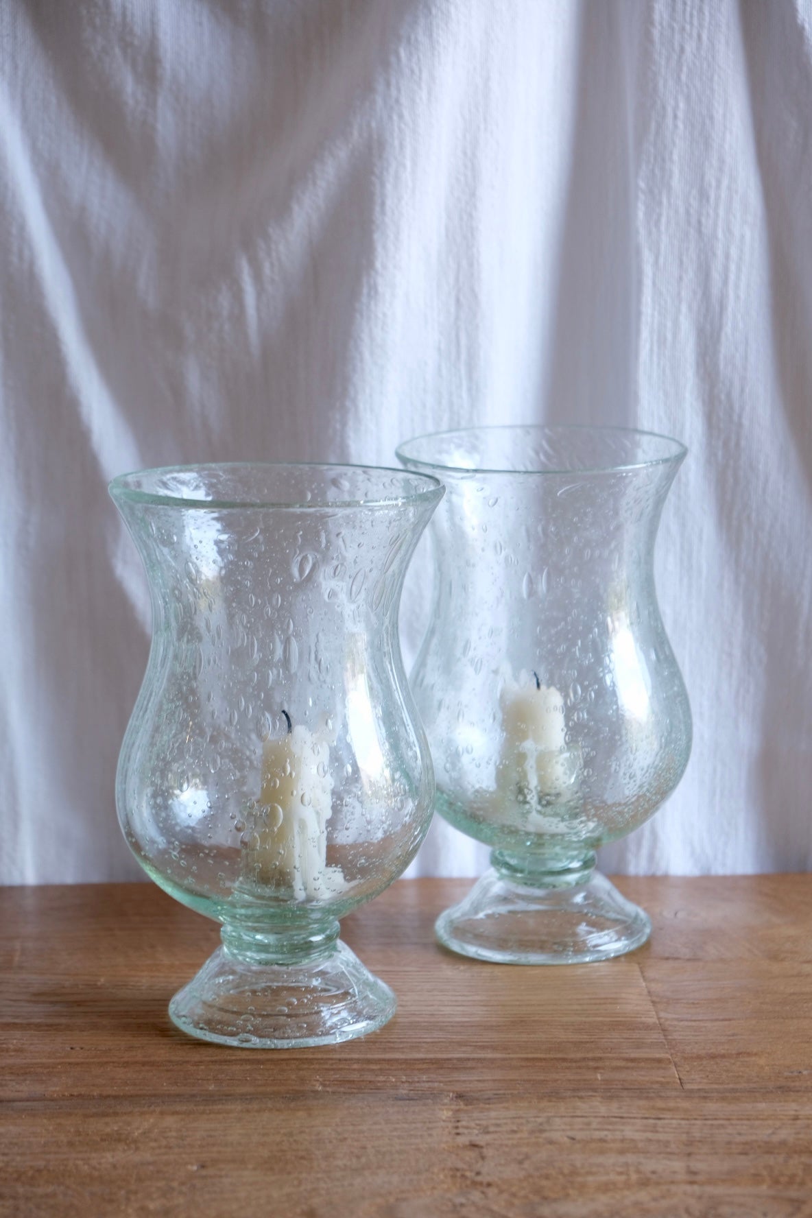 Pair of Biot glass candleholders. 1970s France