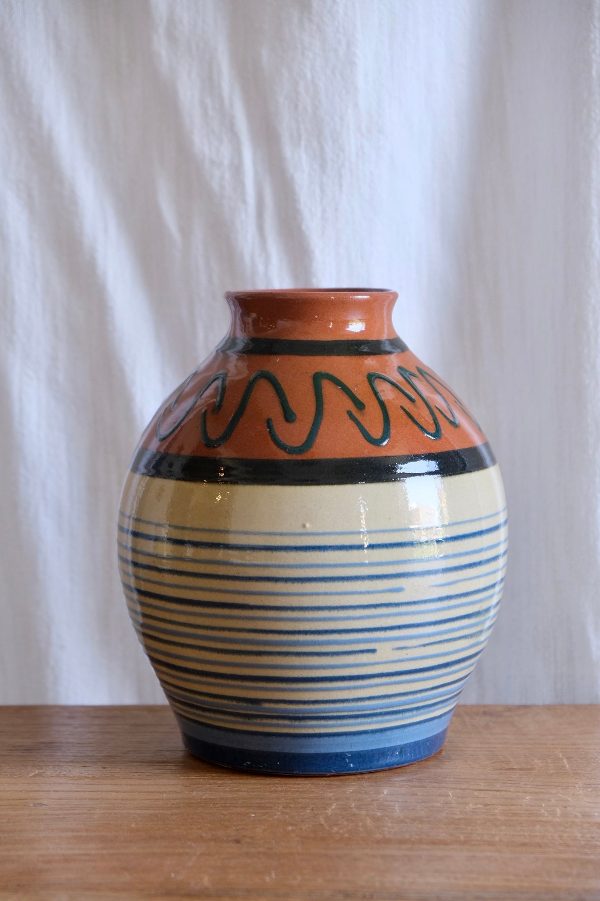 Stripy terracotta vase