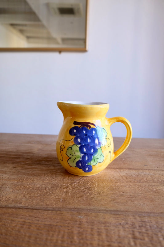 Ceramic jug with hand-painted grapes