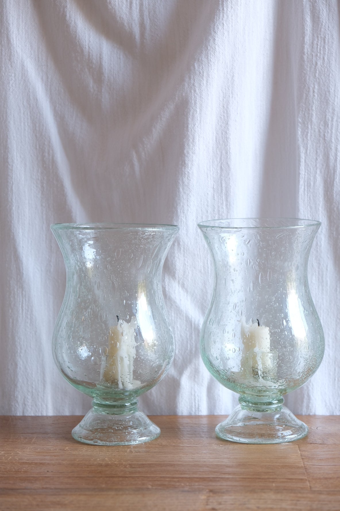 Pair of Biot glass candleholders. 1970s France