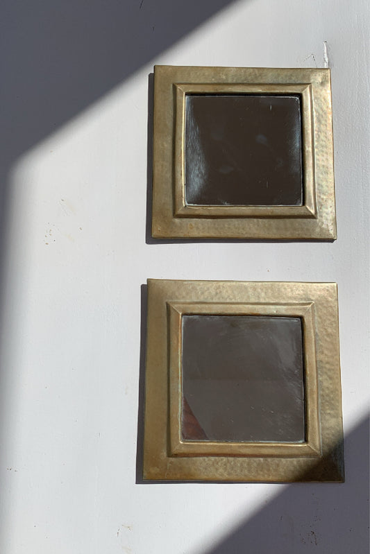 Pair or metal mirrors